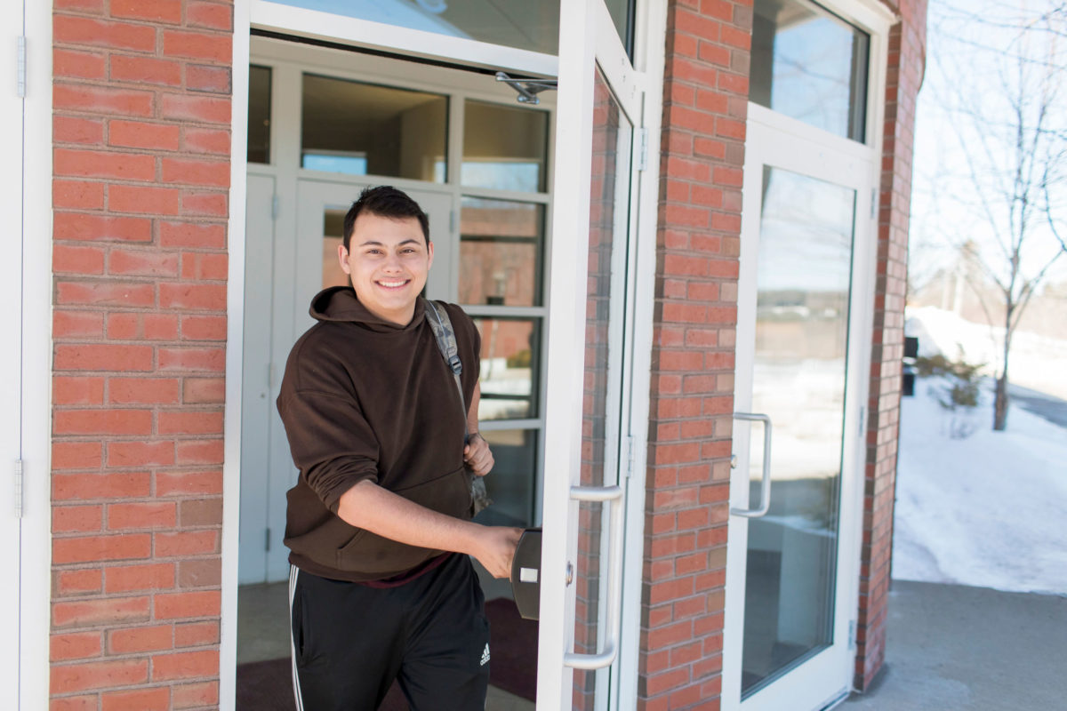 WCCC student walking through doorway