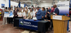 Governor Mills signs supplemental budget making Free College Maine permanent