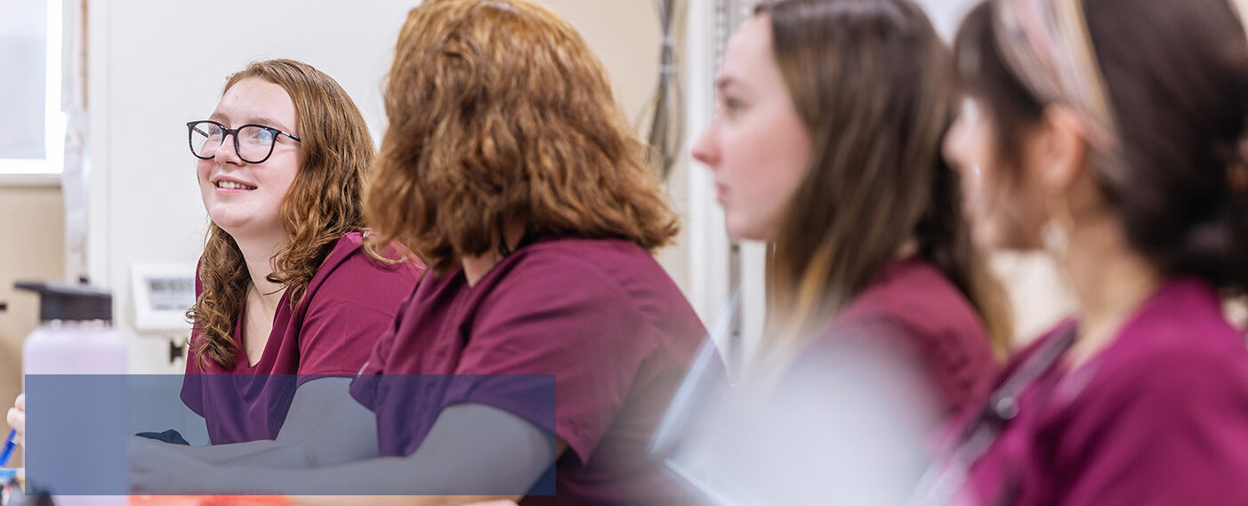Smiling students in lab